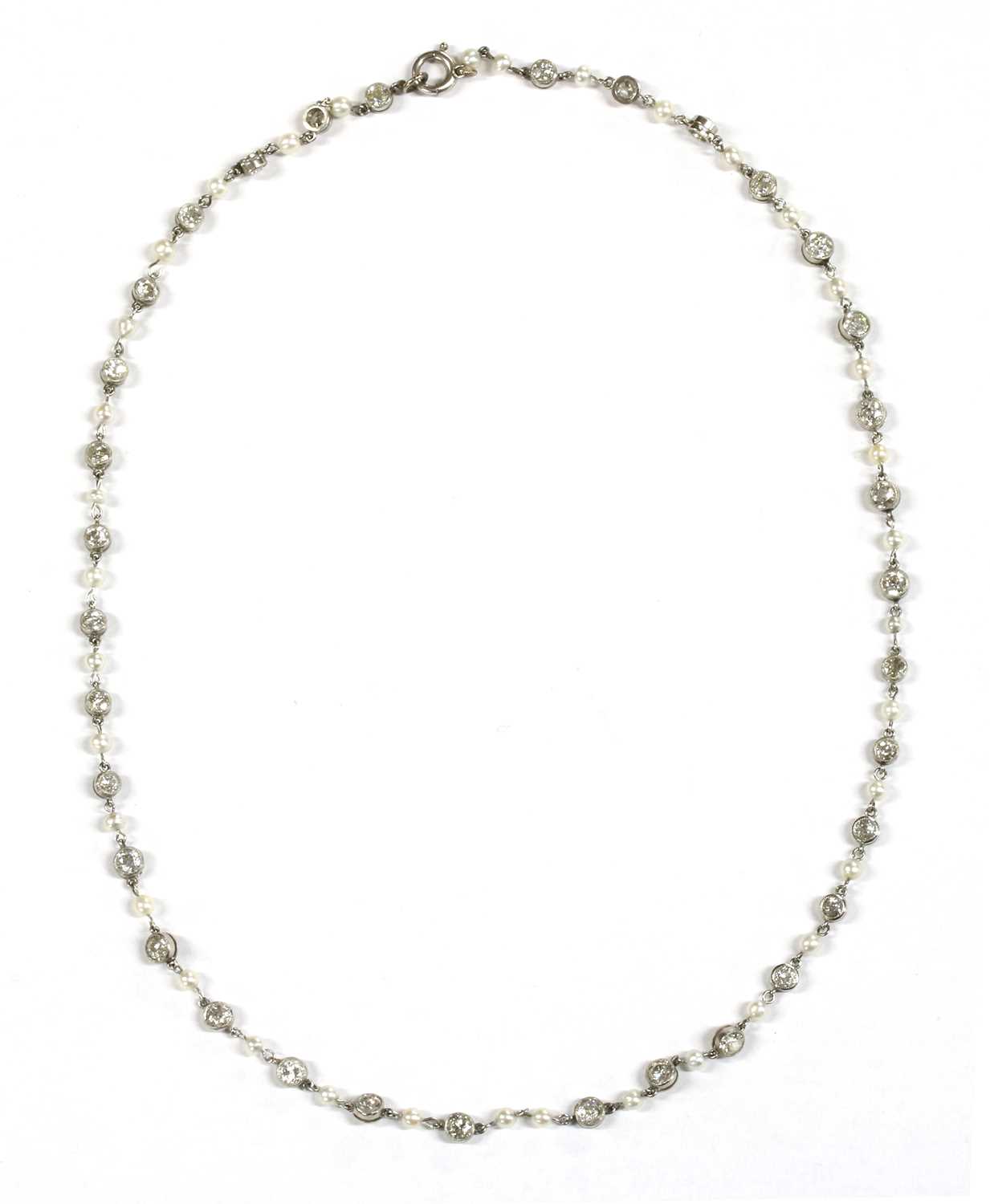 Lot 145 - A platinum diamond and seed pearl necklace