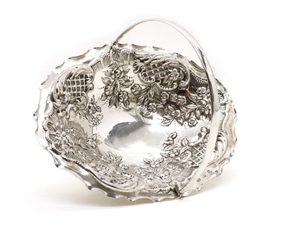 Lot 22 - A late Victorian embossed silver fruit basket