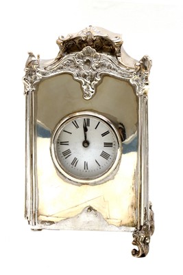 Lot 28 - An Edwardian silver mounted mantel clock
