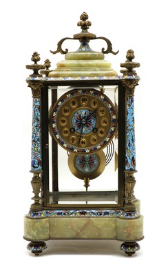 Lot 131 - A late 19th century champleve enamel and green onyx mantel clock