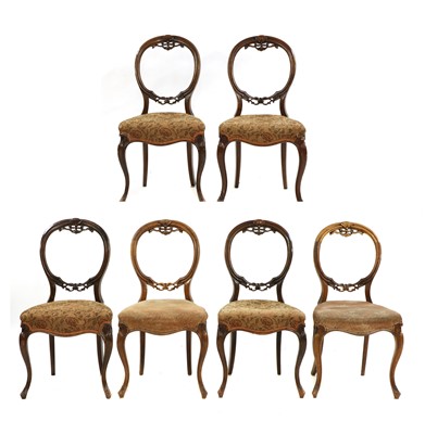 Lot 312 - A set of six Victorian walnut balloon back single dining chairs