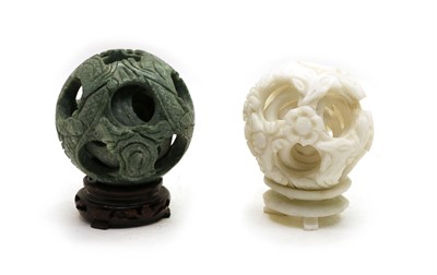 Lot 143 - Two Chinese hard stone puzzle balls