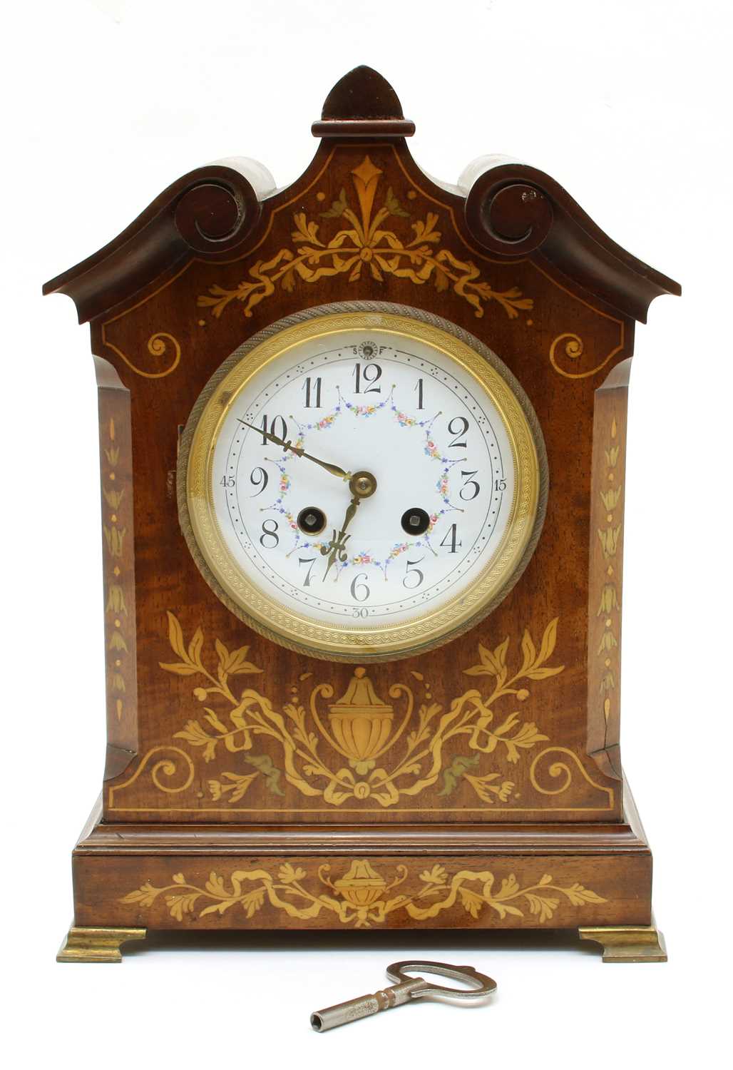 Lot 142 - An Edwardian mahogany and inlaid mantle clock