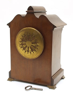 Lot 142 - An Edwardian mahogany and inlaid mantle clock