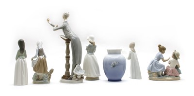 Lot 226 - A collection of porcelain figures