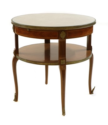 Lot 381 - A walnut circular table