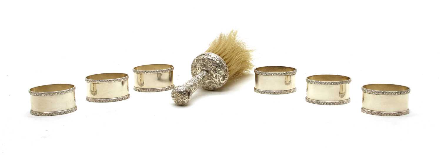 Lot 12 - A set of six silver napkin rings