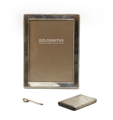 Lot 30 - An early 20th century white metal cigarette case