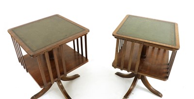 Lot 325 - A pair of reproduction revolving bookcases