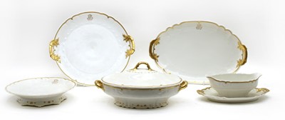 Lot 150 - A Limoges porcelain dinner service, white with gold highlights
