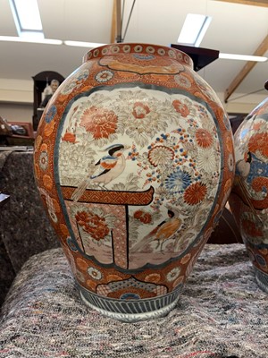 Lot 9 - A large pair of Imari vases and covers