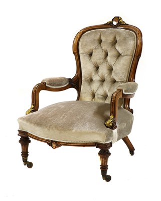 Lot 346 - A Victorian walnut line inlaid and gilt carved armchair