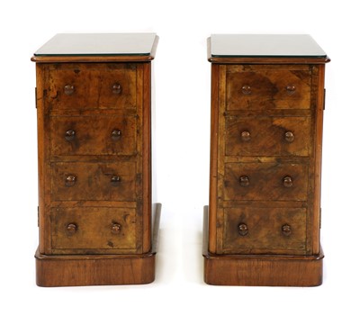 Lot 388 - A pair of mahogany and walnut faux drawer bedside cupboards