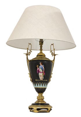 Lot 154 - A French pottery and gilt metal table lamp and shade