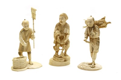 Lot 191 - Three Japanese carved ivory sectional figures