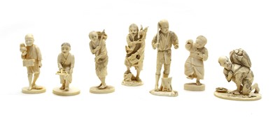 Lot 224 - Seven various late 19th/early 20th century carved ivory sectional figures