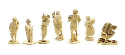 Lot 224 - Seven various late 19th/early 20th century carved ivory sectional figures