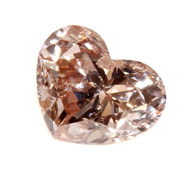 Lot 485 - An unmounted fancy pink heart shaped brilliant cut diamond