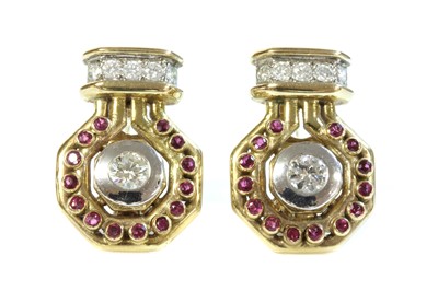 Lot 506 - A pair of 9ct gold diamond and ruby earrings