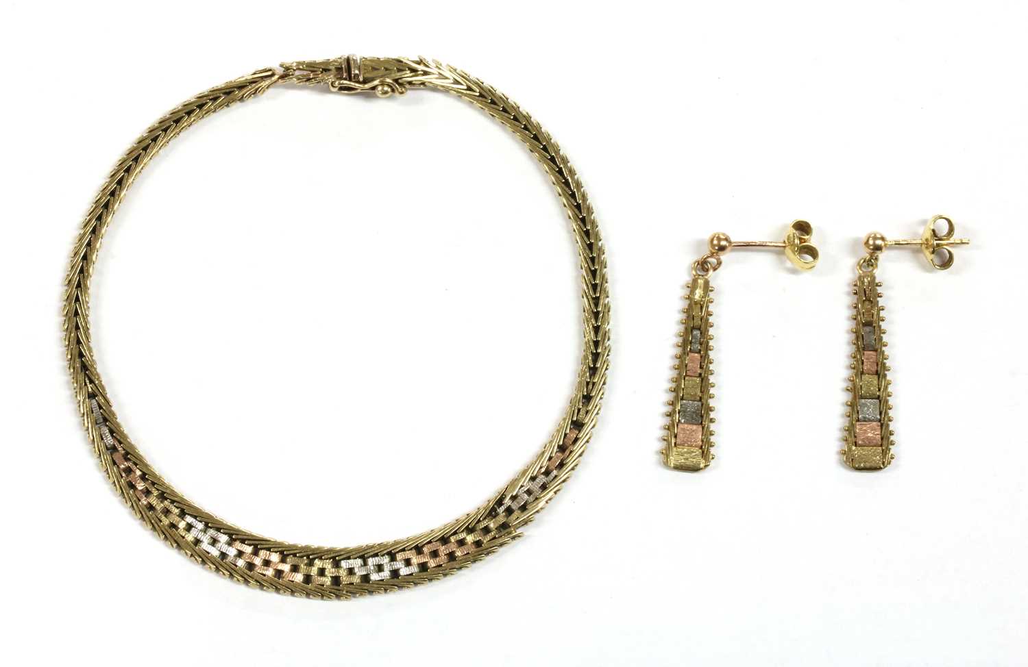 Lot 80 - A 9ct three colour gold brick link bracelet and earring suite, c.1980