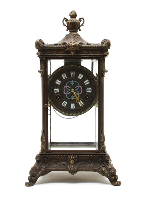 Lot 187 - A cast four glass mantel clock