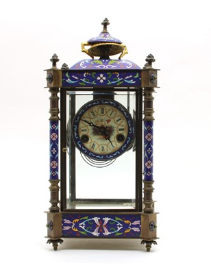 Lot 159 - A cast four glass enamelled mantel clock