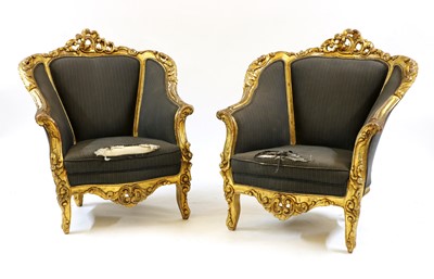 Lot 311 - A pair of gilt armchairs