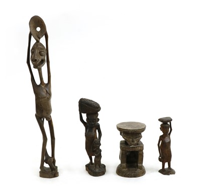 Lot 241 - An African figural stool