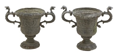 Lot 396 - A pair of twin-handled lead urns