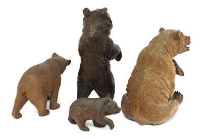 Lot 368 - Four carved wooden Black Forest bears