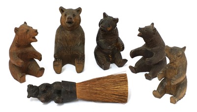 Lot 367 - A group of five carved wooden Black Forest bears
