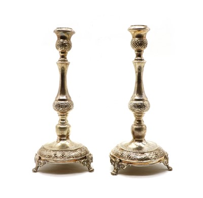Lot 35 - A pair of Continental silver candlesticks