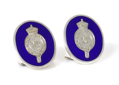 Lot 268 - Of Royal interest: a pair of cased H.R.H. Prince Charles, royal presentation sterling silver and enamel oval chain link cufflinks, by Gerald Benney