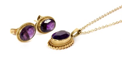 Lot 161 - A pair of 9ct gold single stone amethyst earrings