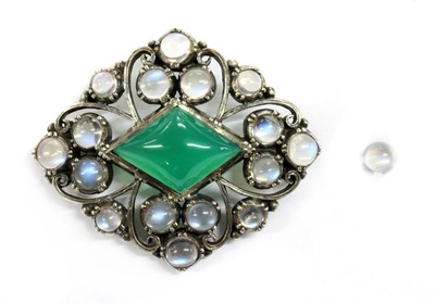 Lot 50 - An Arts & Crafts silver dyed green agate and moonstone brooch