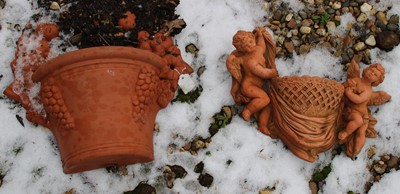 Lot 322 - Two terracotta wall planters