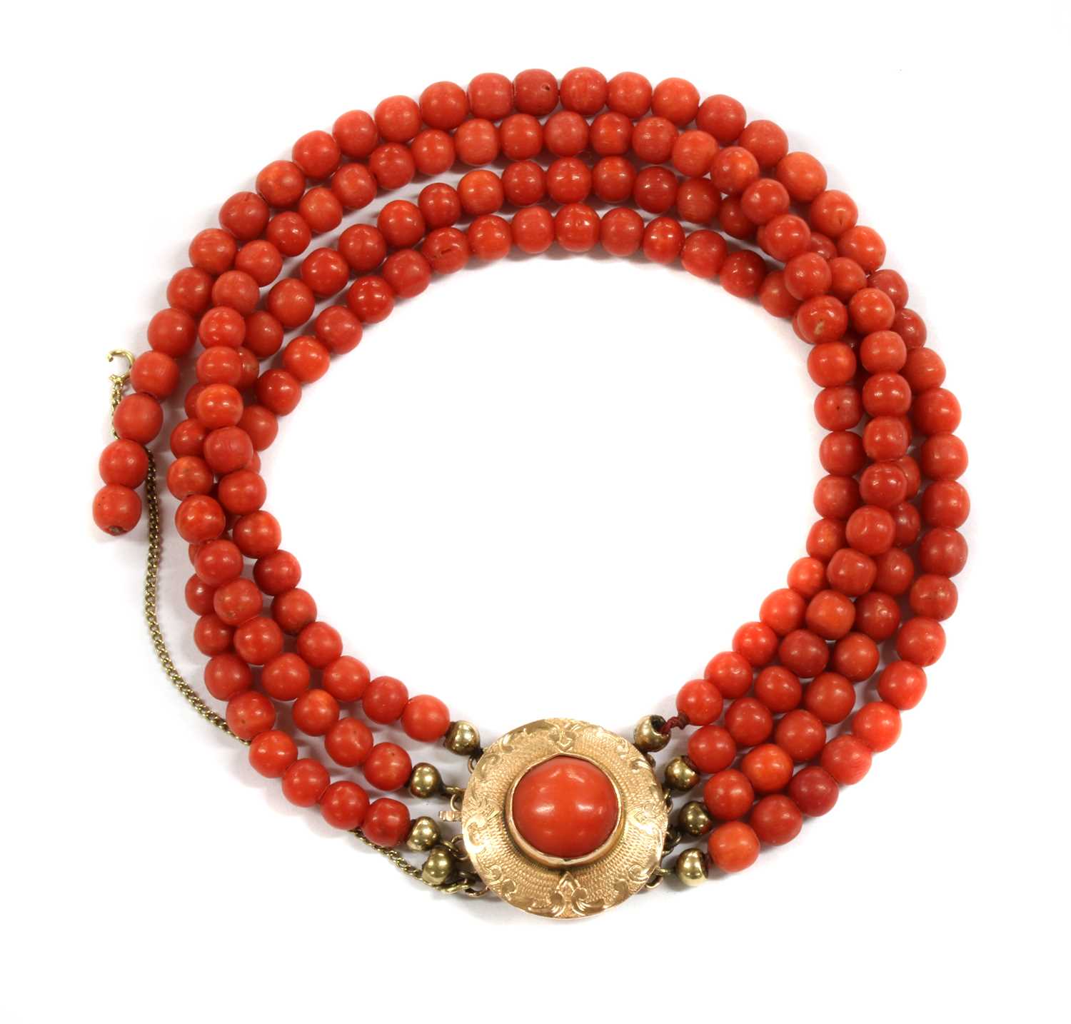 Lot 37 - A Dutch four row coral bead bracelet