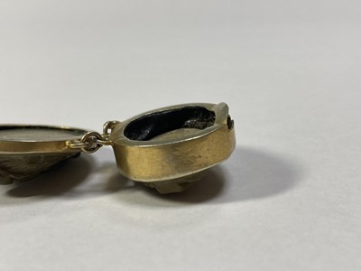 Lot 11 - A gilt metal lava stone cameo bracelet