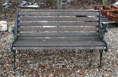 Lot 325 - A Victorian design cast iron and teak garden bench