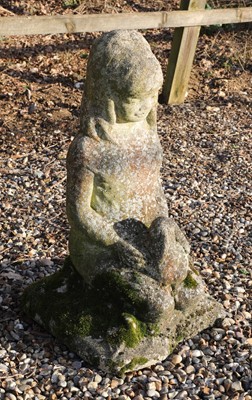 Lot 407 - A reconstituted stone model of a kneeling girl