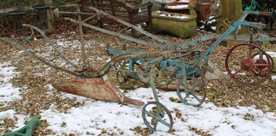 Lot 327 - Three wrought and cast iron vintage ploughs (3)