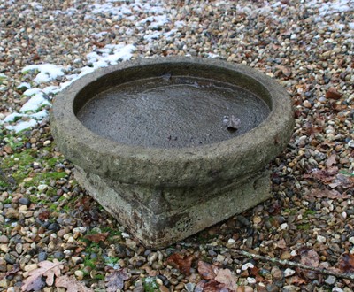Lot 334 - A reconstituted stone bird bath