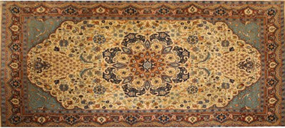Lot 264 - A small Persian Tabriz rug