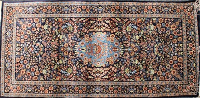 Lot 263 - A Persian wool and silk rug