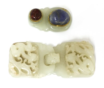 Lot 101 - A Chinese jade belt buckle