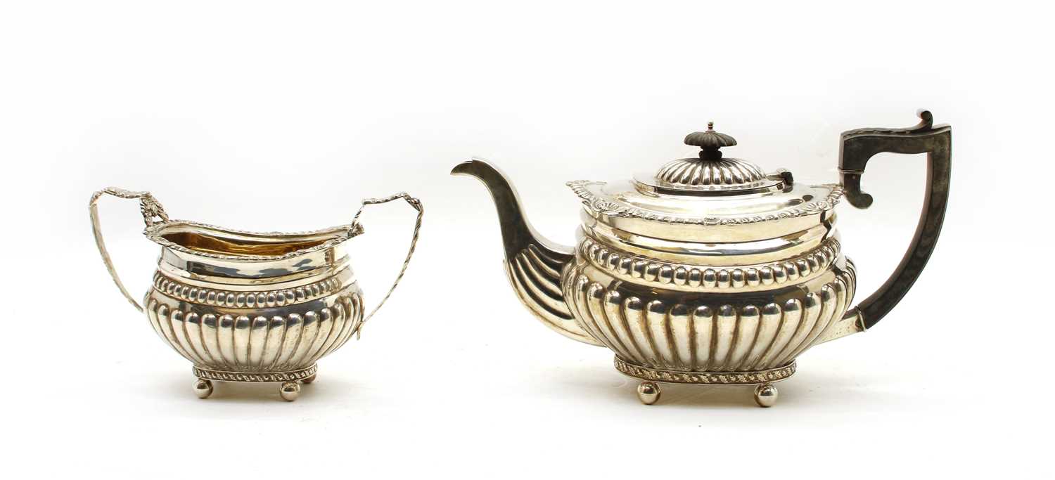 Lot 17 - A Late Victorian silver teapot & sugar bowl (2)