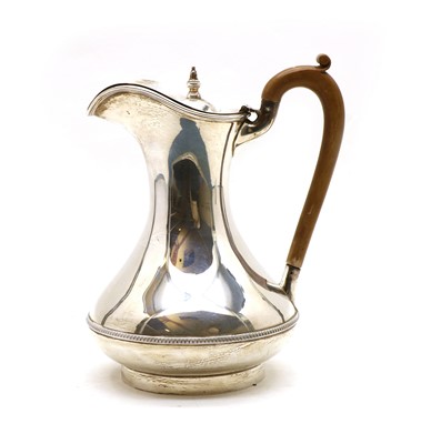 Lot 18 - A modern silver hot water jug