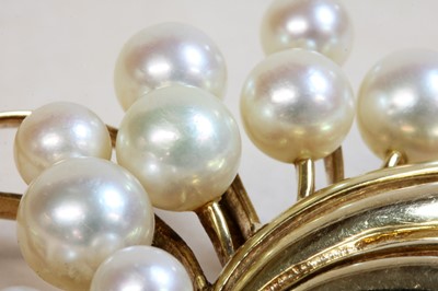 Lot 218 - A gold and cultured pearl spray brooch, by Mikimoto