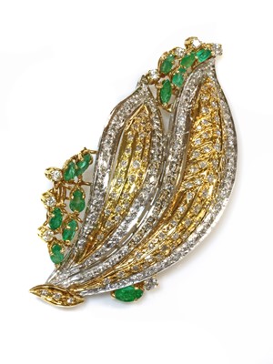 Lot 203 - A two colour gold emerald and diamond spray brooch/pendant