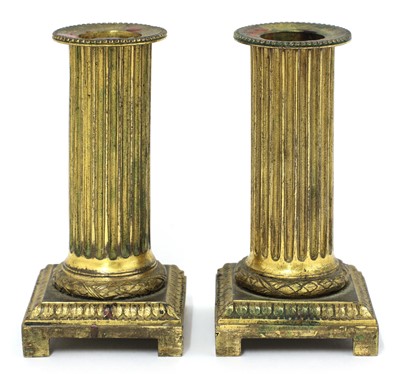 Lot 769 - A pair of gilt bronze candlesticks